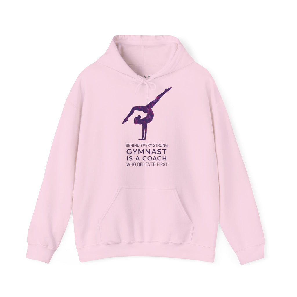 Behind every strong gymnast is a coach who believed first - Gymnast Coach Hoodie (Adults)