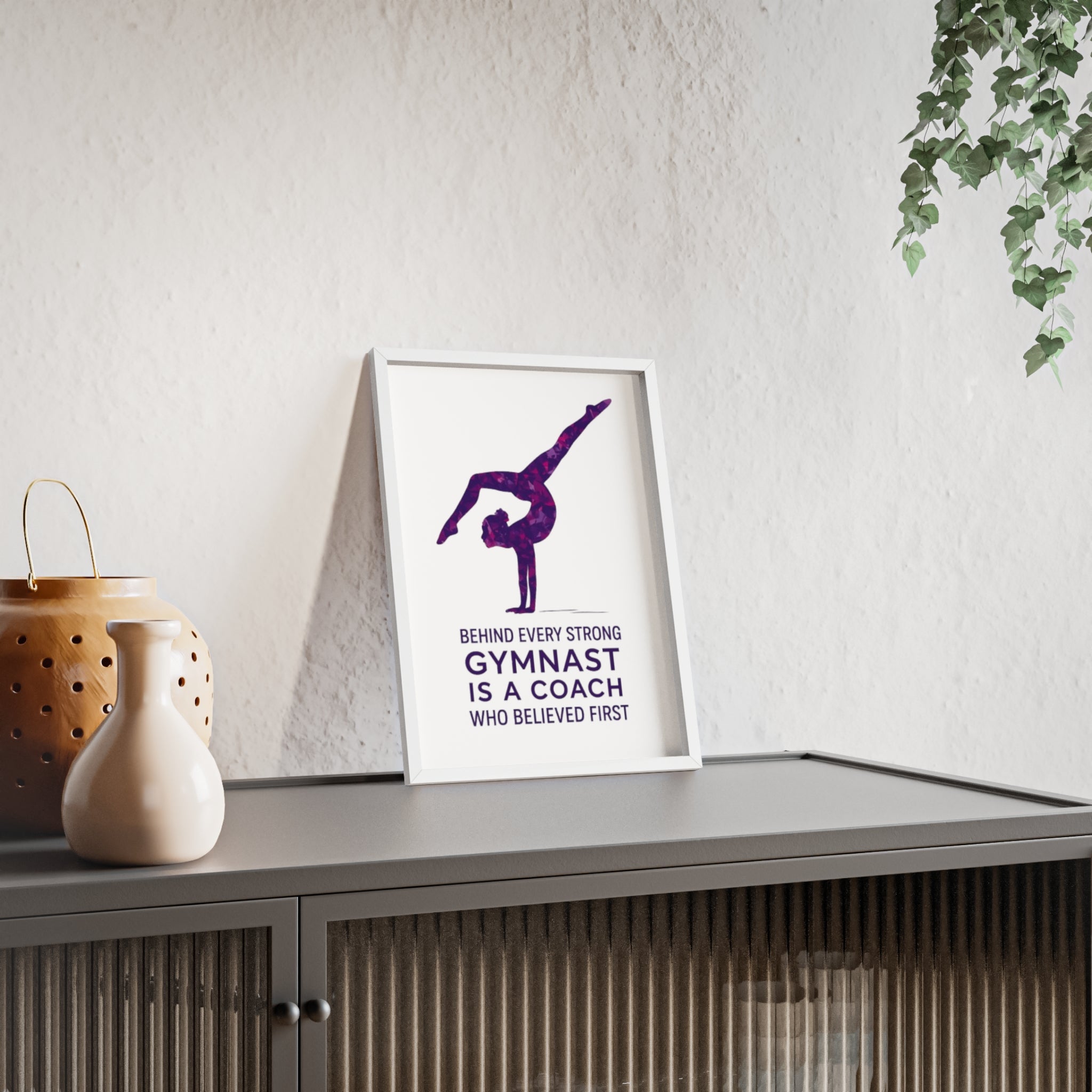 'Behind Every Strong Gymnast Is A Coach Who Believed First' - Poster with Wooden Frame